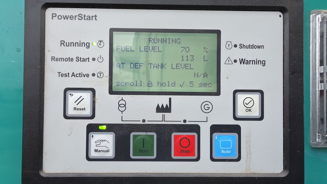 Cummins PowerStart controller on a running set, showing RUNNING status and the live fuel level.