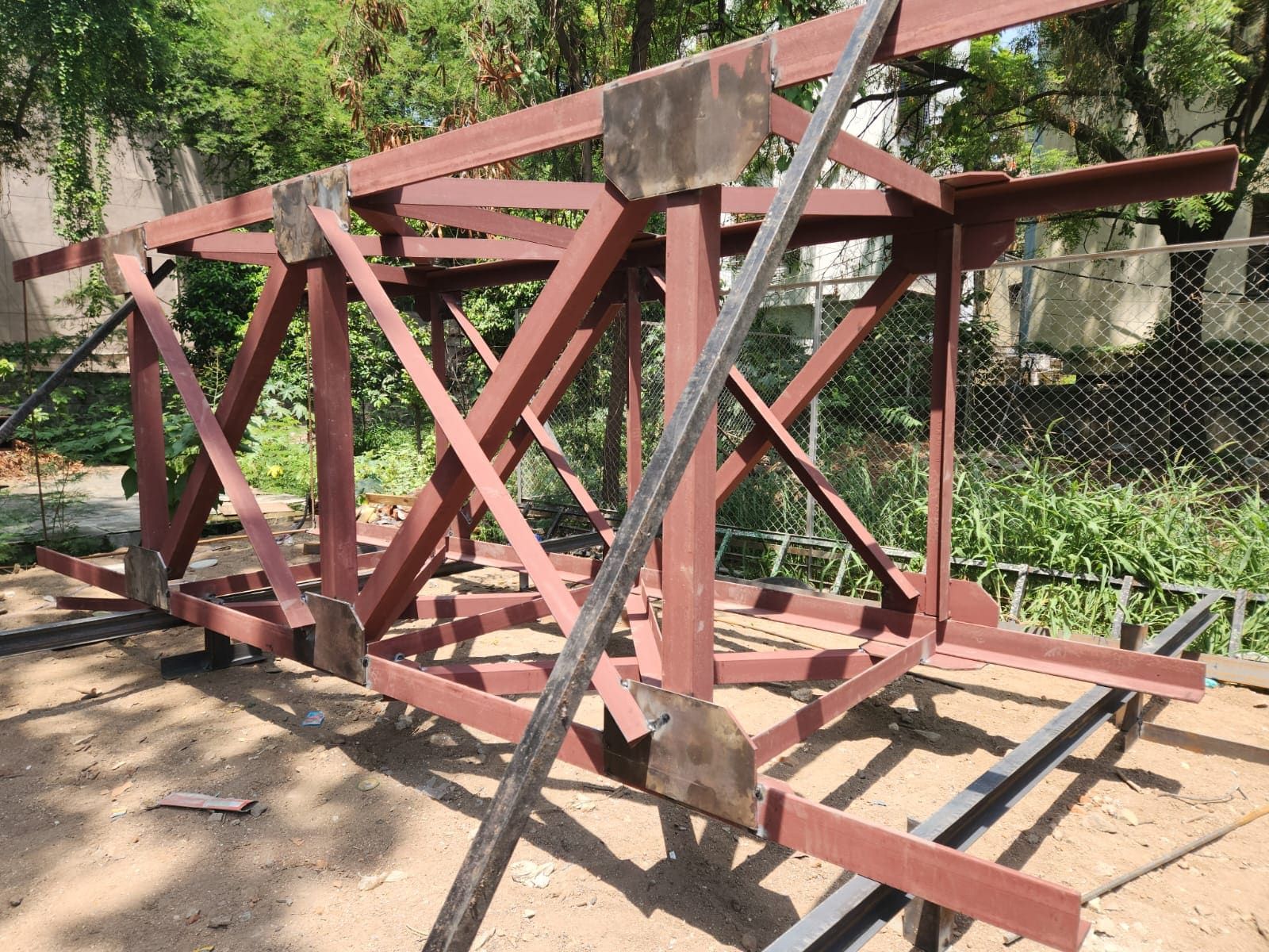 Lattice stack sections in red-oxide primer during ground fabrication