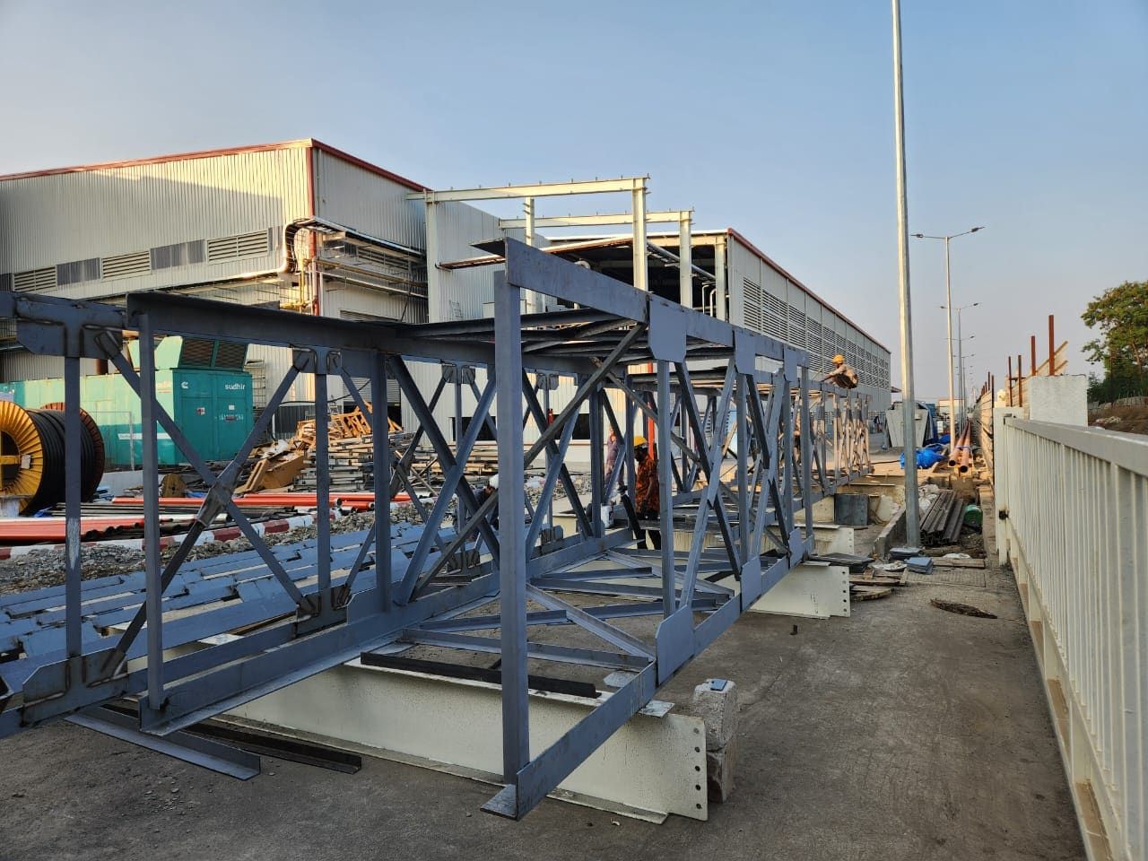 Lattice stack sections laid out during ground fabrication outside the plant building