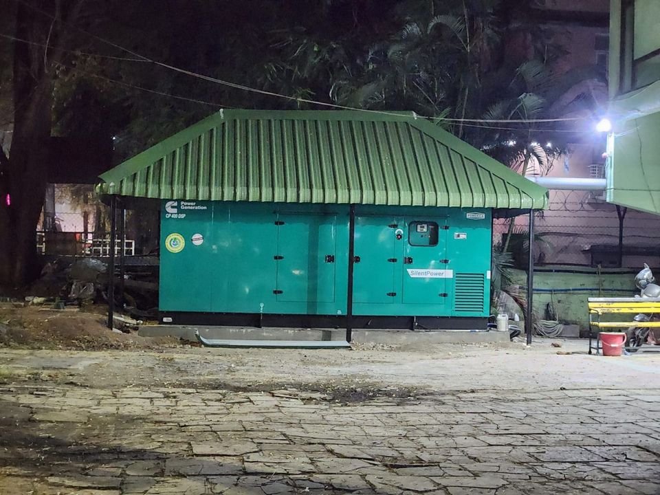 A 400 kVA silent DG set installed under a custom steel weather canopy
