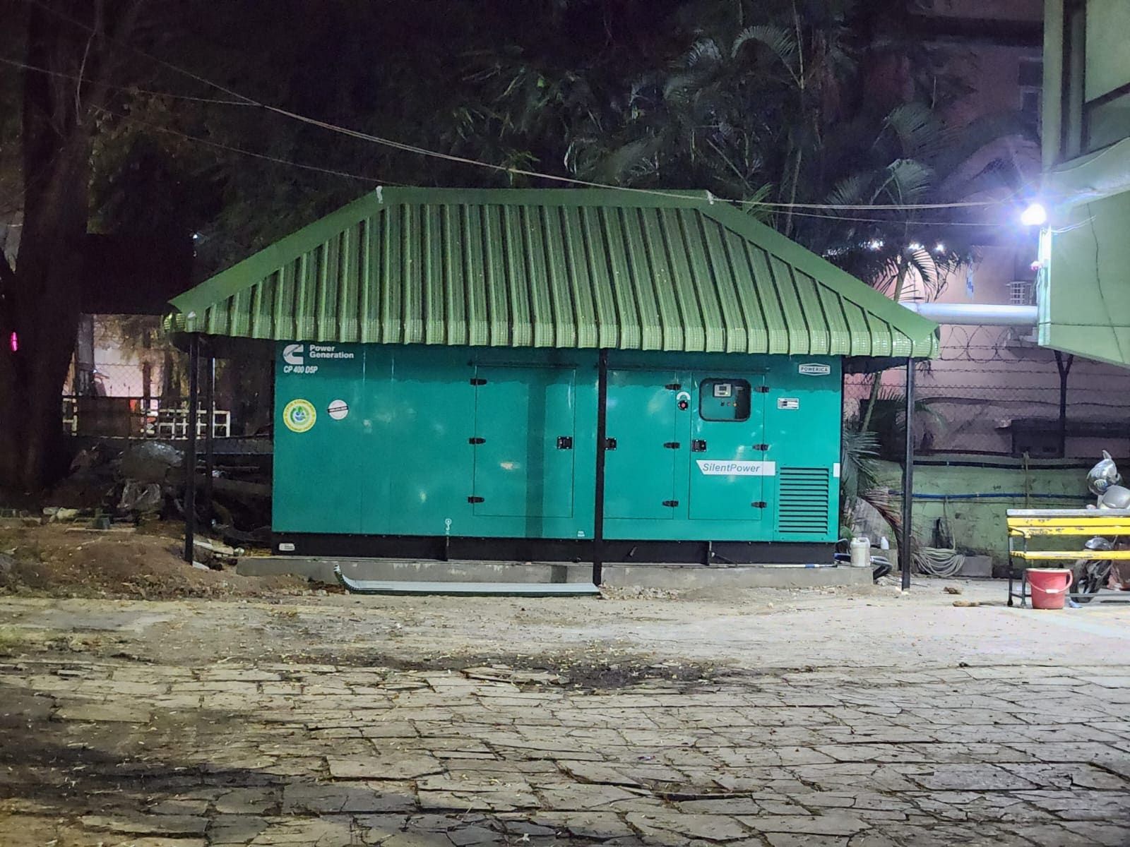A 400 kVA silent DG set installed under a custom steel weather canopy