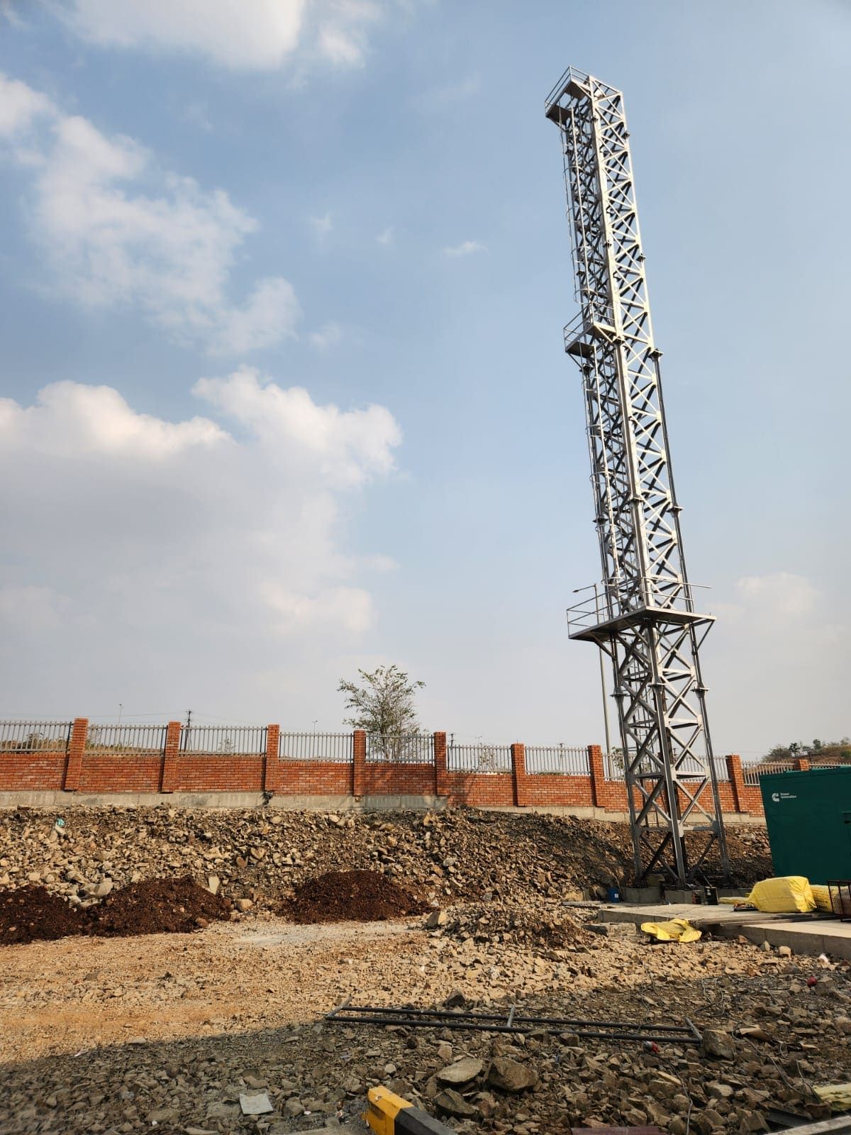 Erected 30 metre self-supporting lattice stack with ladder and rest platforms