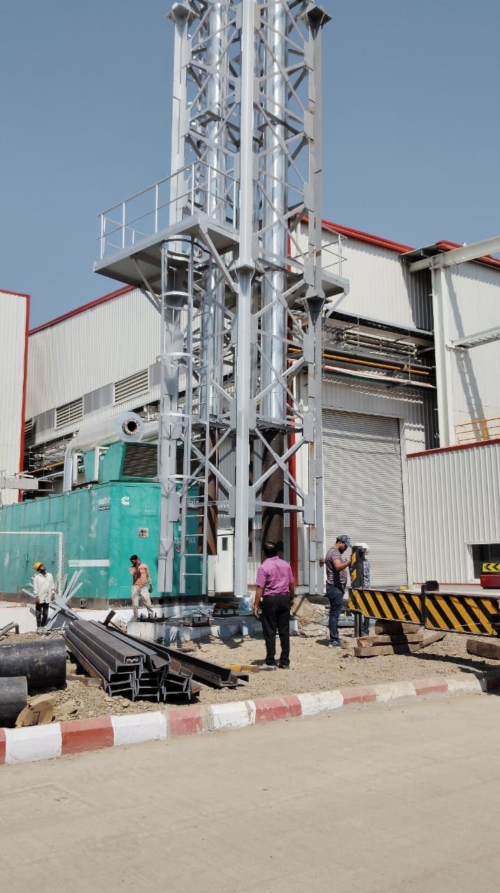 Lower section of a 30 metre stack with inspection platform, DG set alongside