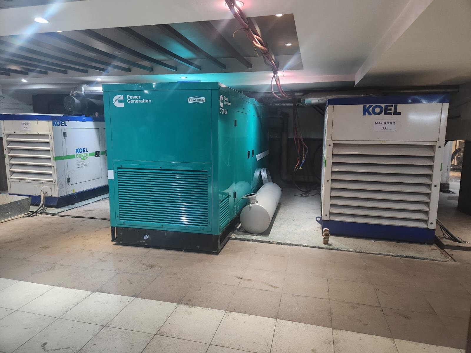 A 200 kVA Cummins DG set installed in a basement genset room